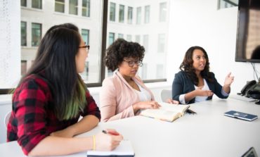 Women in a boardroom having a discussion